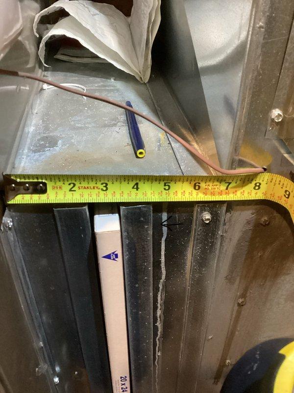 Performed annual cooling system maintenance on an air conditioning unit. Identified significant debris and dirt accumulation on the condenser coil that was restricting proper airflow. Cleaned the outdoor unit, removing all debris from the protective grille and surrounding area, and provided customer with an estimate for air scrubber/purifier options as requested.