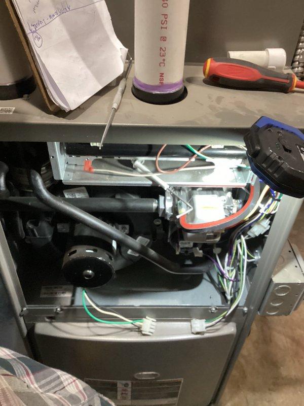 Performed annual maintenance on Lennox furnace (0 years old, CM: 2025). Inspected all internal components including motor, electrical connections, and exhaust/intake PVC piping. Unit is functioning properly with no issues identified; completed standard tune-up procedures and documented service with photos of system interior and exterior installation.