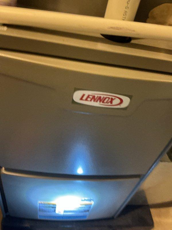 Performed annual maintenance check on Lennox furnace as part of Air Care Membership. Verified proper system function with no issues detected. Confirmed ecobee thermostat operation showing correct temperature reading and proper holding status.