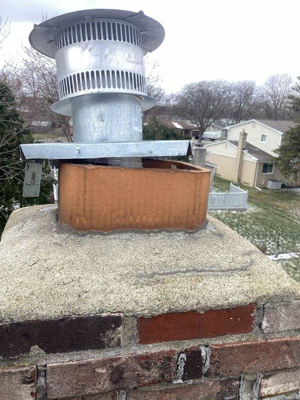 Responded to service call for damaged chimney cap that had detached and pulled out the chimney liner. Upon inspection, found the original cap had been improperly installed with minimal silicone adhesive. Reinstalled and properly secured the chimney liner and cap assembly to prevent future detachment. Equipment is under both parts and labor warranty.