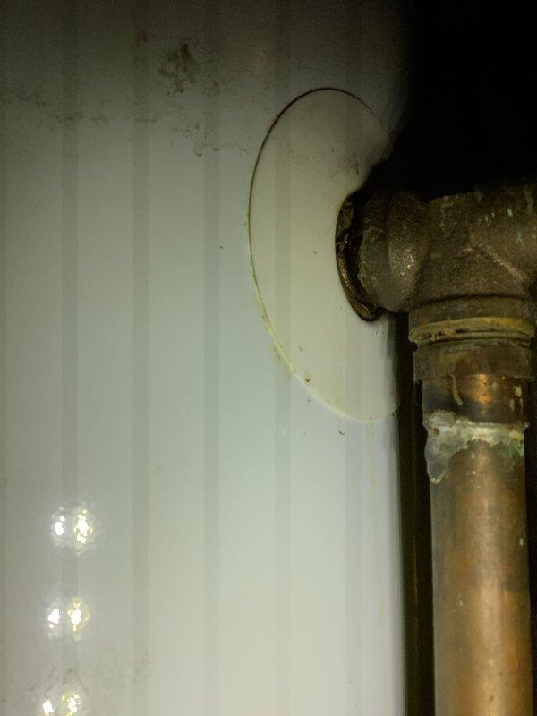 Completed annual furnace maintenance per membership agreement. Inspected blower motor assembly, electrical connections, and control components, documenting all in satisfactory working condition. Noted copper pipe with visible corrosion and greenish discoloration at fitting connection point, which should be monitored for potential future service needs.