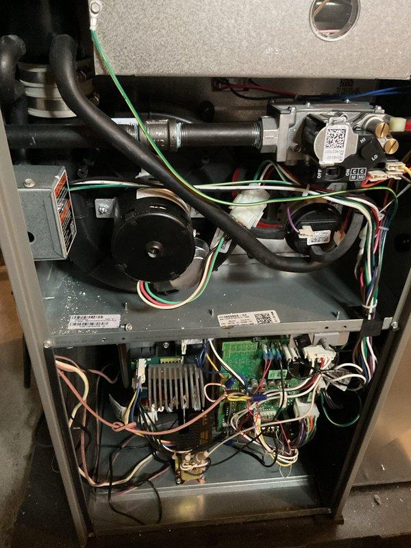 Performed annual furnace maintenance per Air Care Membership agreement. Completed comprehensive inspection of furnace interior components including blower motor, wiring connections, circuit board, and heat exchanger - all found to be in proper working condition. System operating normally with no issues detected; documentation photos taken of internal components for service records.