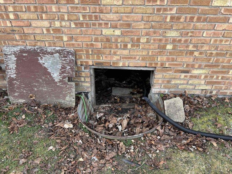 Performed assessment of flood-damaged HVAC system in crawl space, where unit had been submerged in approximately 6 inches of water, voiding manufacturer warranty. Recommended full system replacement with new Lennox ML296UH110XV60C furnace and CK40HT-48C coil due to water damage to the existing one-year-old unit.