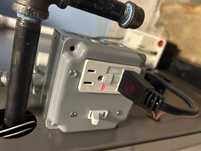 Responded to service call for 1-year-old furnace blowing cool air. Inspected electrical connections and found GFCI outlet in tripped state. Reset GFCI outlet, restoring power to the system, which allowed proper heating function to resume. Unit is operating within normal parameters after electrical reset.