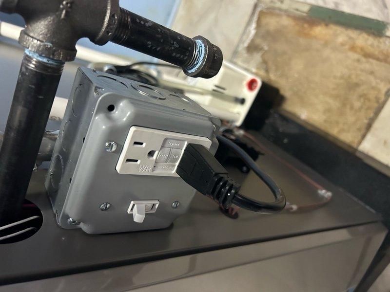 Responded to service call for 1-year-old furnace blowing cool air. Inspected electrical connections and found GFCI outlet in tripped state. Reset GFCI outlet, restoring power to the system, which allowed proper heating function to resume. Unit is operating within normal parameters after electrical reset.