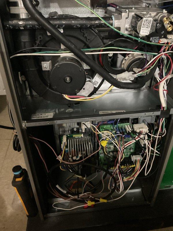Performed annual furnace maintenance on 0-year-old unit with contract maintenance through 2025. Conducted comprehensive system inspection with access panels removed, examining blower assembly, circuit boards, electrical connections, and control components. All systems verified operational with no issues detected; unit is functioning properly and ready for heating season.