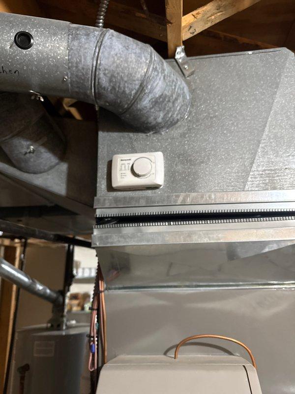 Successfully installed a new 110,000 BTU furnace according to Option 2 specifications. Completed all mechanical connections and reconnected existing ductwork, with proper thermostat integration. Final inspection confirms proper installation with all components in working order.