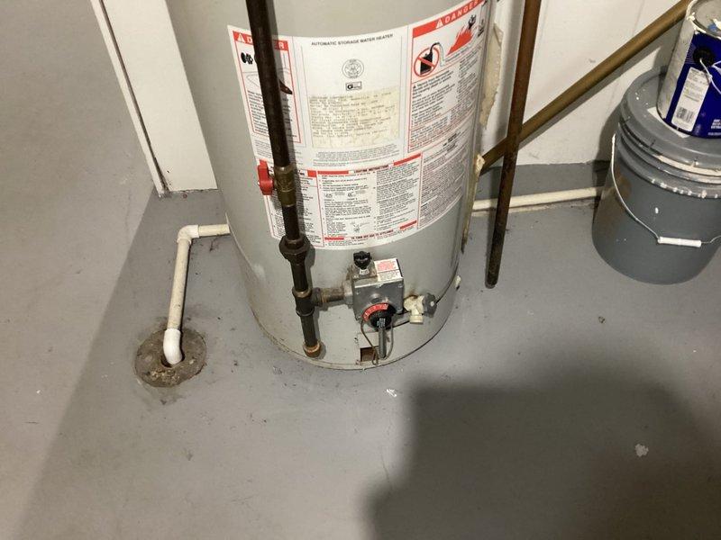 Responded to no hot water complaint on Lochinvar water heater. Diagnosed faulty thermocouple and pilot assembly. Replaced thermocouple, cleaned pilot assembly, and verified proper ignition. Unit now functioning correctly with consistent hot water supply.