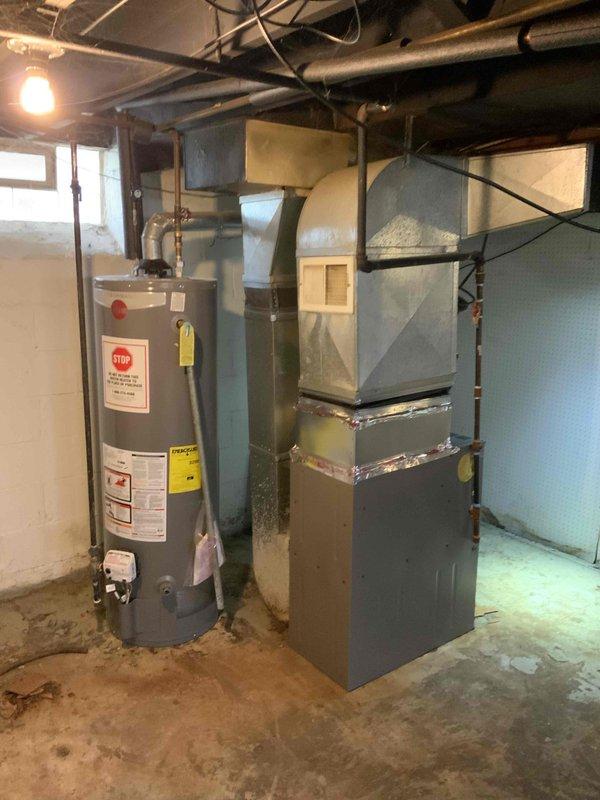 Inspected customer's existing HVAC system and identified a non-code compliant furnace installation that presents liability concerns. Documented the current installation with photos showing improper ductwork connections and ventilation issues. Provided full system replacement estimate with recommendation for immediate action due to safety concerns.