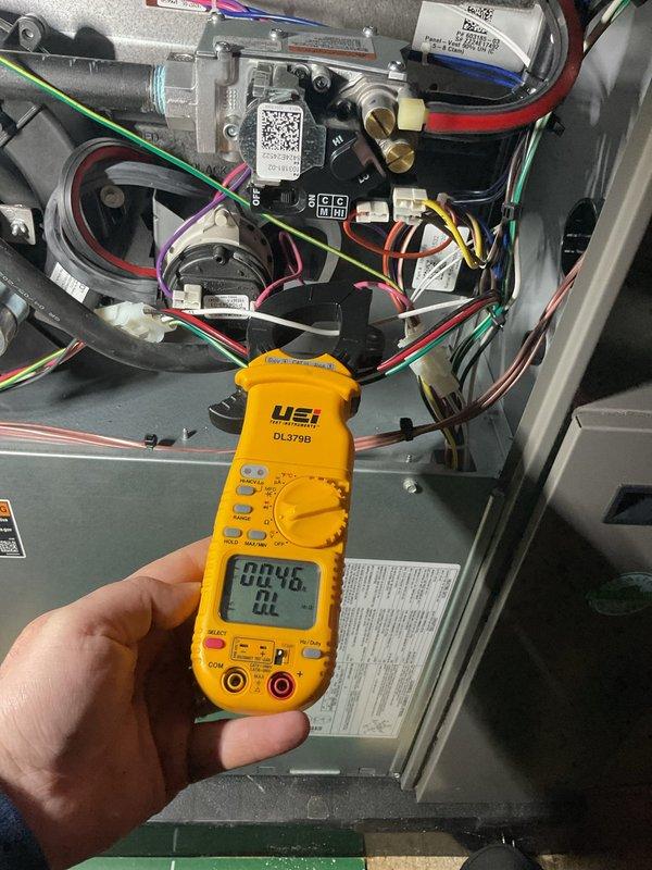 Performed annual heating maintenance on furnace system as part of customer's membership. Conducted comprehensive inspection with internal component examination, including visual inspection of wiring harnesses and circuit board. Completed electrical testing with clamp meter to verify proper amp draw (0.46) on system components, ensuring optimal operation for the upcoming heating season.