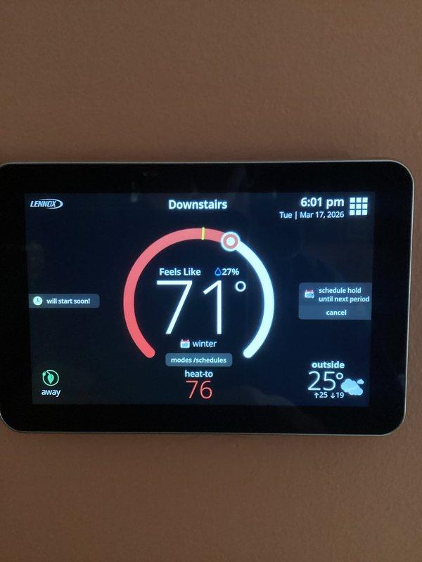 Performed annual heating maintenance on Lennox furnace system with digital thermostat. Inspected interior components including blower motor assembly, circuit board, and wiring connections. System was operating correctly with thermostat set to heat-to 76°F in winter mode; verified proper functionality and confirmed system would initiate heating cycle as programmed.