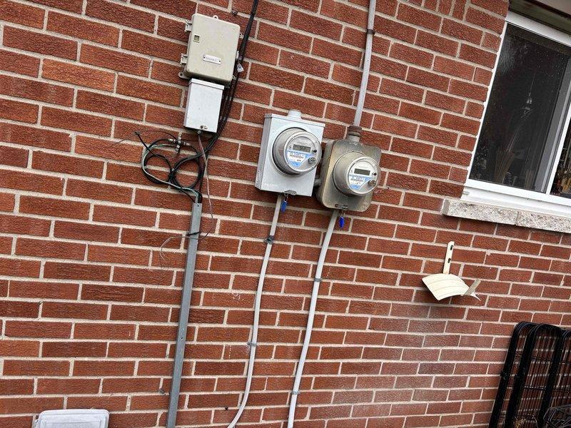 Conducted site evaluation for complete HVAC system replacement, documenting existing electrical infrastructure including service panel capacity and meter configuration. Customer requires immediate replacement of aging furnace and air conditioner with preference for morning appointments.