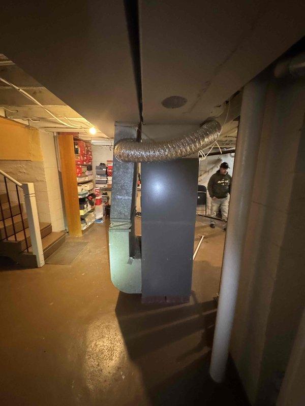 Conducted assessment of non-operational 10-year-old air conditioning system located in basement with natural gas furnace. Performed measurements of existing mechanical systems and documented current installation configuration. Completed comprehensive quote for full A/C system replacement (Quote #126346-02).