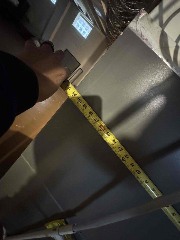 Conducted assessment of non-operational 10-year-old air conditioning system located in basement with natural gas furnace. Performed measurements of existing mechanical systems and documented current installation configuration. Completed comprehensive quote for full A/C system replacement (Quote #126346-02).