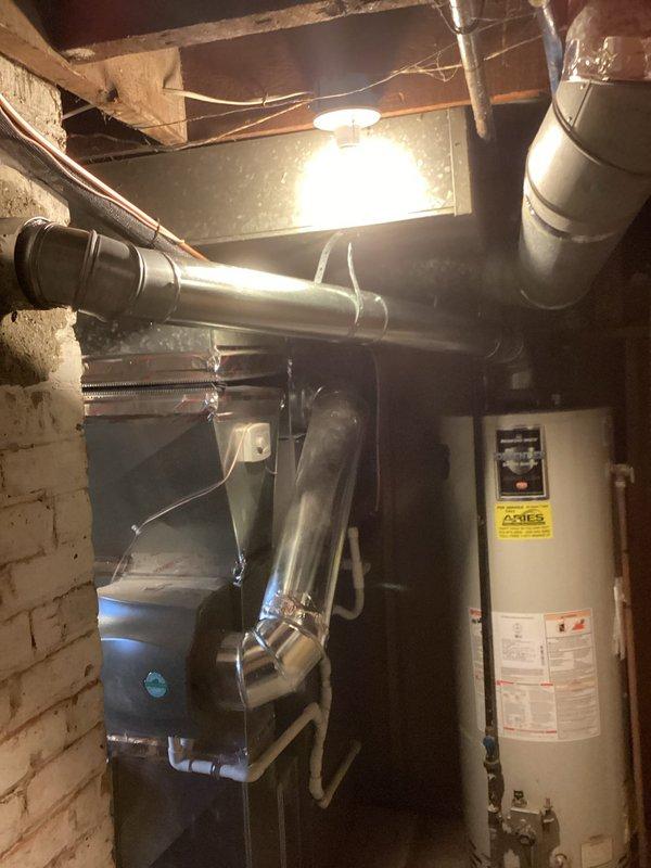 Completed return visit to install chimney liner. Successfully dropped liner through existing chimney stack, connecting with the HVAC system in the basement mechanical room. Verified proper connection to the flue pipe and ensured all components were secured according to manufacturer specifications.