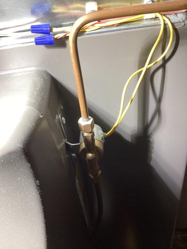 Performed scheduled Air Care Cooling maintenance service. Inspected copper refrigerant lines and electrical connections for proper installation. Replaced air filter with new pleated filter to maintain system efficiency and airflow.