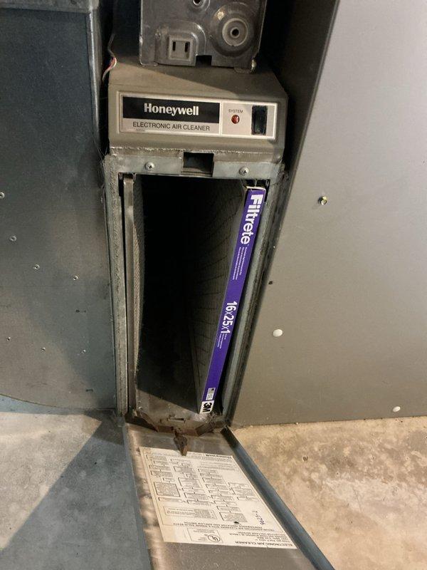 Responded to no-heat call on a residential forced air furnace system. Inspected the Honeywell Electronic Air Cleaner and replaced the dirty Filtrete 16x25 filter. Performed diagnostic on the furnace control board and electrical components, finding a failed limit switch which was preventing ignition. Replaced faulty limit switch, tested system operation through multiple heating cycles, and verified proper airflow and temperature rise.