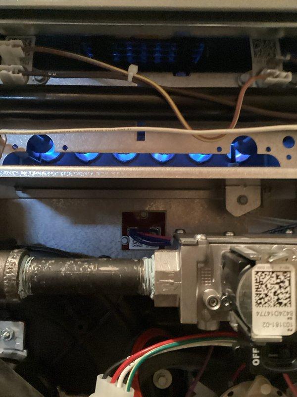 Performed annual furnace maintenance as part of Air Care Membership on a 10-year-old furnace. Inspected all internal components including electrical connections, gas valve assembly, and heat exchanger. Verified proper flame pattern and combustion operation, with blue flames indicating efficient operation. All systems functioning normally with no issues detected.