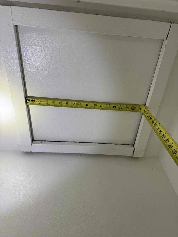 Completed measurements of existing ductwork and access panel for a small-to-mid sized heating and cooling system installation. Verified 7-inch galvanized metal duct pipe joint dimensions and documented access panel measurements in preparation for natural gas/propane HVAC system to be installed in closet location.