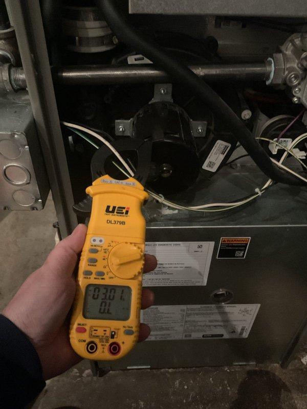 Performed 5-year ComfortGuard Maintenance inspection on HVAC system. Conducted comprehensive electrical diagnostics using UEi DL379B digital clamp meter, measuring resistance and current values to verify proper electrical operation of components. All readings were within manufacturer specifications with no issues detected.