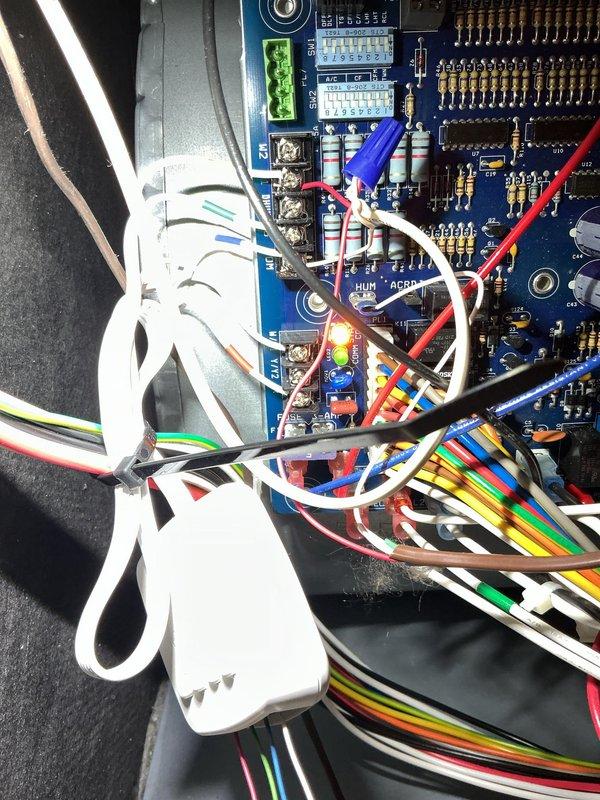 Installed customer-supplied Ecobee thermostat and troubleshooted system issue where condensing fan was activating during heat calls. Verified wiring connections at the circuit board and thermostat, ensuring proper terminal configuration for separate heating and cooling operations. System now functioning correctly with appropriate sequencing of components.