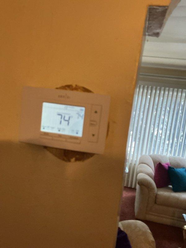 Performed complimentary annual furnace maintenance under existing Air Care Membership for 10-year-old furnace system. Conducted standard tune-up protocol with system currently operating at 74°F as verified on programmable thermostat. All components inspected and functioning properly with membership valid through 2025.