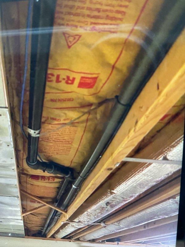 Inspected gas line installation in basement area as part of recall service. Identified improper use of cross bracing as gas line supports and several bent support brackets. Replaced damaged supports and properly secured gas lines according to code requirements. Documentation provided via affidavit for gas line compliance.