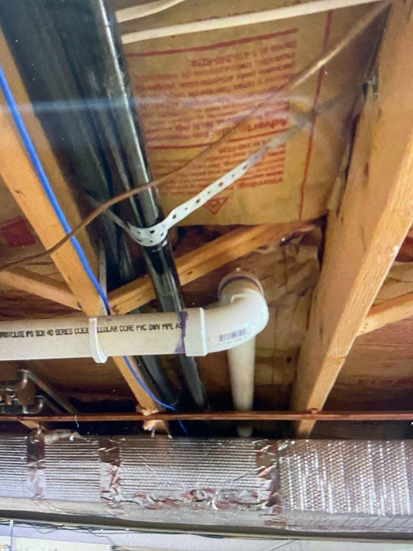 Inspected gas line installation in basement area as part of recall service. Identified improper use of cross bracing as gas line supports and several bent support brackets. Replaced damaged supports and properly secured gas lines according to code requirements. Documentation provided via affidavit for gas line compliance.