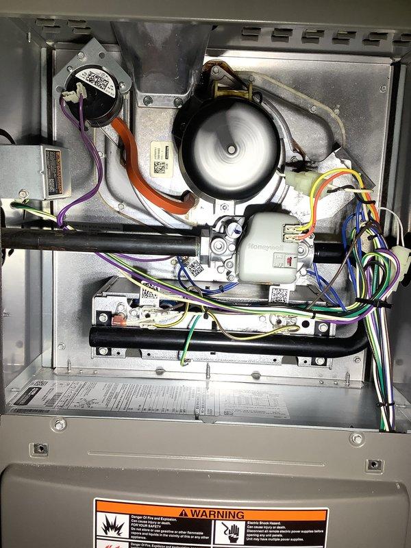 Completed annual heating maintenance on 10-year-old furnace system. Performed comprehensive inspection of internal components including blower motor, wiring connections, and pressure switch, all found to be in proper working condition. Temperature readings confirmed system is operating within normal parameters at 39°F.