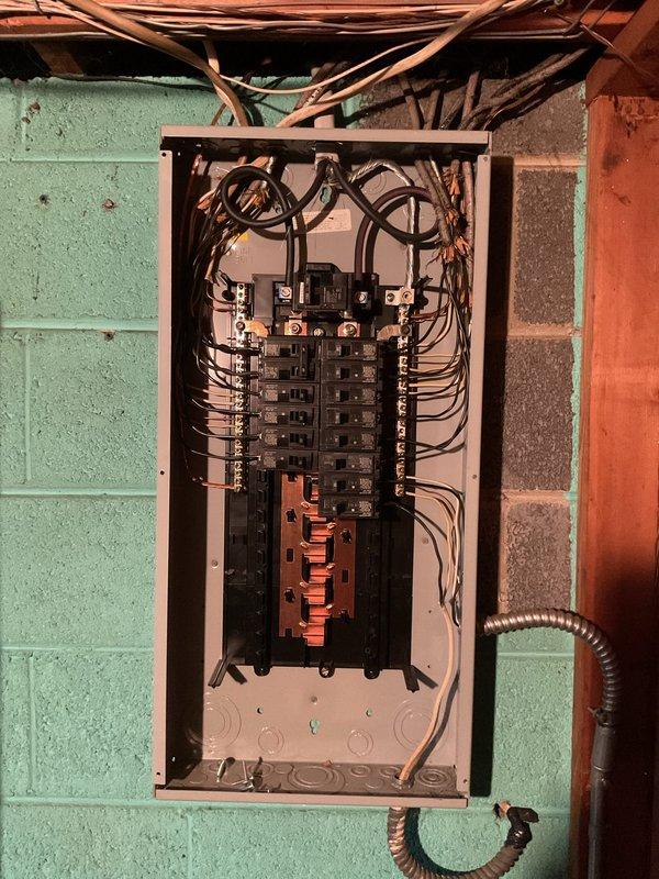 Diagnosed and repaired power outage affecting two back bedrooms by identifying faulty circuit breakers in the main electrical panel. Inspection revealed loose connections at the breaker terminals which were tightened and tested, successfully restoring electrical service to all affected areas.