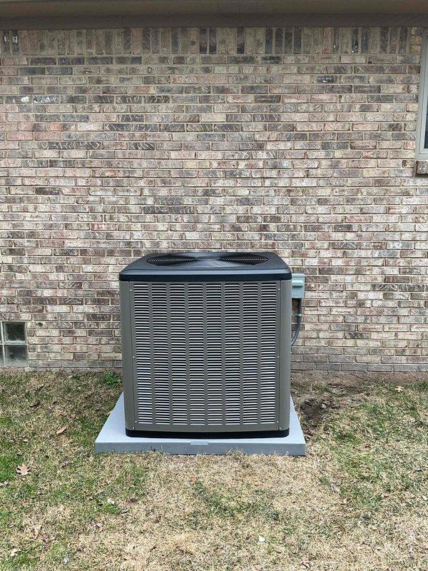 Successfully completed installation of a complete HVAC system including a 90,000 BTU furnace and 3-ton air conditioning unit. The outdoor condenser was properly mounted on a concrete pad against the exterior brick wall with all electrical connections secured. Mechanical and electrical permits were obtained, and all utility connections were properly established with the existing metering system.