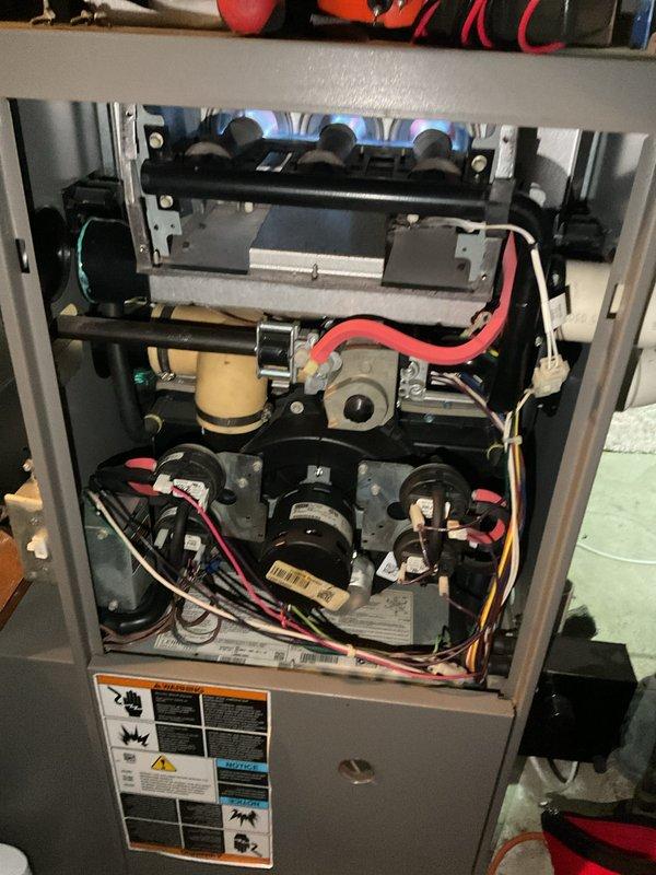 Completed AHM service on residential furnace, performed comprehensive inspection of interior components including blower motors, heat exchanger, electrical connections, and control board. All systems functioning properly with no issues identified; documented condition with detailed photos and reminded customer to schedule upcoming ACM.