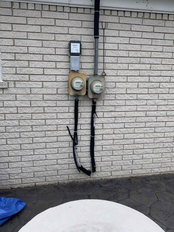 Conducted comprehensive HVAC replacement assessment for 20+ year old system with non-functional A/C and operational furnace. Evaluated existing natural gas furnace setup in basement location, inspected utility connections including gas meter and electrical components. Customer is comparing quotes from multiple providers.