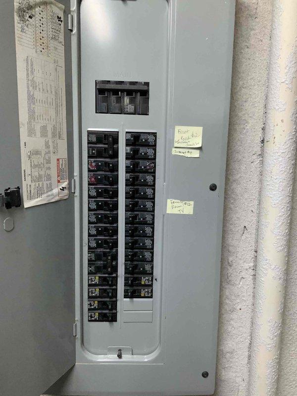 Conducted site assessment for EV charging station installation, including inspection of electrical panel capacity and available breaker space. Evaluated garage layout for optimal charger placement with consideration for existing utilities and storage. Documented current electrical infrastructure to determine if panel upgrade would be necessary to support vehicle charging requirements.