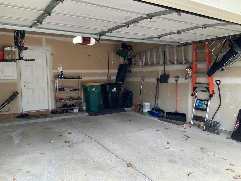 Conducted site assessment for EV charging station installation, including inspection of electrical panel capacity and available breaker space. Evaluated garage layout for optimal charger placement with consideration for existing utilities and storage. Documented current electrical infrastructure to determine if panel upgrade would be necessary to support vehicle charging requirements.