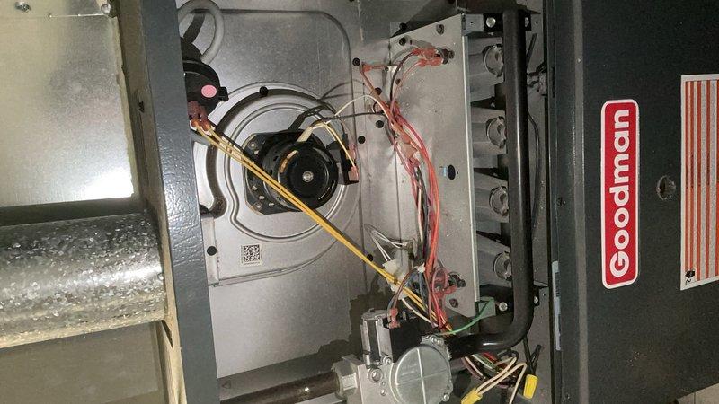 Performed annual heating maintenance check on Goodman air handler system. Inspected interior components including blower motor, electrical connections, and control systems. All components found to be in normal working condition with some dust accumulation; no issues requiring immediate attention were identified.
