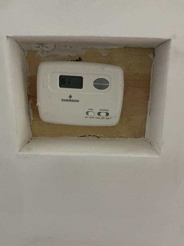 Responded to no-heat call for new furnace (3 months old) that was only blowing cold air. Inspected system components including Emerson thermostat (reading 51°F) and air filter, which was clean and properly installed. Diagnosed and resolved issue under existing parts and labor warranty.