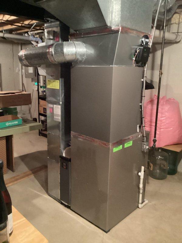 Successfully completed installation of a 3.5-ton A/C unit with matching coil in rear location. System includes new furnace with proper ductwork connections and PVC condensate drainage. All mechanical permits were secured, and final connections were made according to manufacturer specifications.