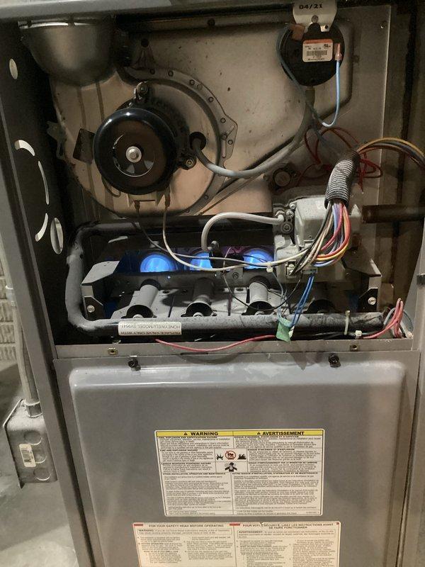 Performed annual furnace maintenance on a furnace that was functioning properly at time of service. Inspected blower motor assembly, flame sensor, and electrical connections, noting normal dust accumulation but no operational issues. Identified heavily soiled filter with significant discoloration requiring replacement to maintain system efficiency and proper airflow.