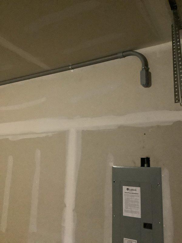 Responded to callback for electrical safety concerns during HVAC installation. Protected exposed SE cable and installed proper conduit system including PVC piping, elbows, fittings, and junction boxes. Addressed drywall damage around newly installed 3.5-ton A/C unit and coil.
