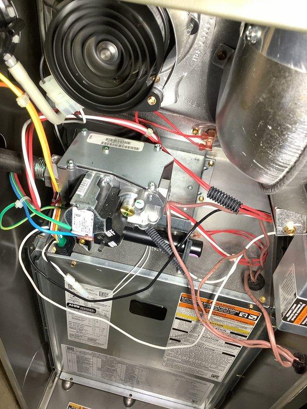Performed scheduled Air Care Cooling and Heating maintenance service. Inspected furnace components including blower motor, electrical connections, and control board, all found to be in normal working condition with no visible damage or abnormal wear. Verified proper gas combustion with healthy blue flames in the combustion chamber and no issues detected.