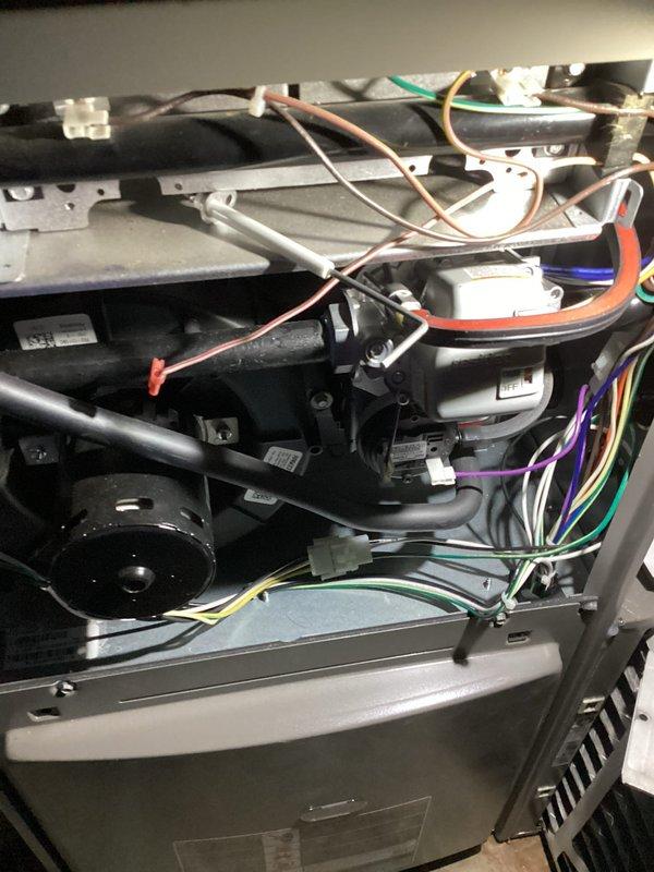 Performed annual maintenance on Lennox furnace under Air Care Membership after customer reported system required reset. Inspected interior electrical components including wiring connections, motor assembly, and control board. System is now operating normally with no issues detected.