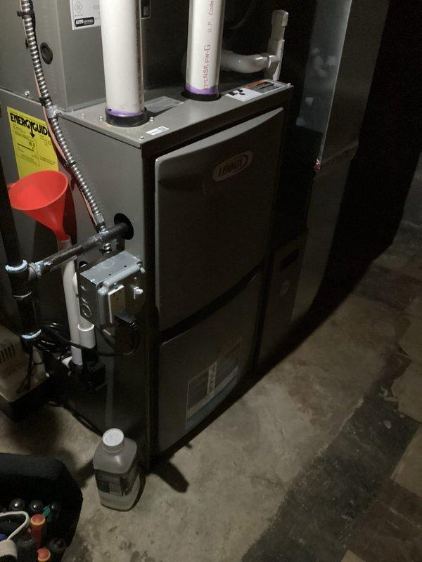 Performed annual maintenance on Lennox furnace under Air Care Membership after customer reported system required reset. Inspected interior electrical components including wiring connections, motor assembly, and control board. System is now operating normally with no issues detected.
