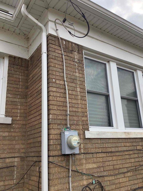 Performed site assessment for potential backup generator installation, evaluating electrical service panel and exterior meter location. Customer expressed interest in Kohler or Generac models. Documented existing electrical infrastructure with photos to develop appropriate installation specifications for residential backup power solution.