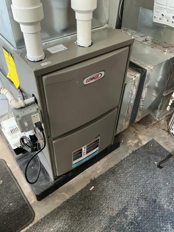 Performed annual heating system maintenance on Lennox forced air furnace. Conducted comprehensive tune-up including inspection of ventilation system, PVC exhaust pipes, and electrical connections. System is functioning properly with next maintenance recommended in 2025.