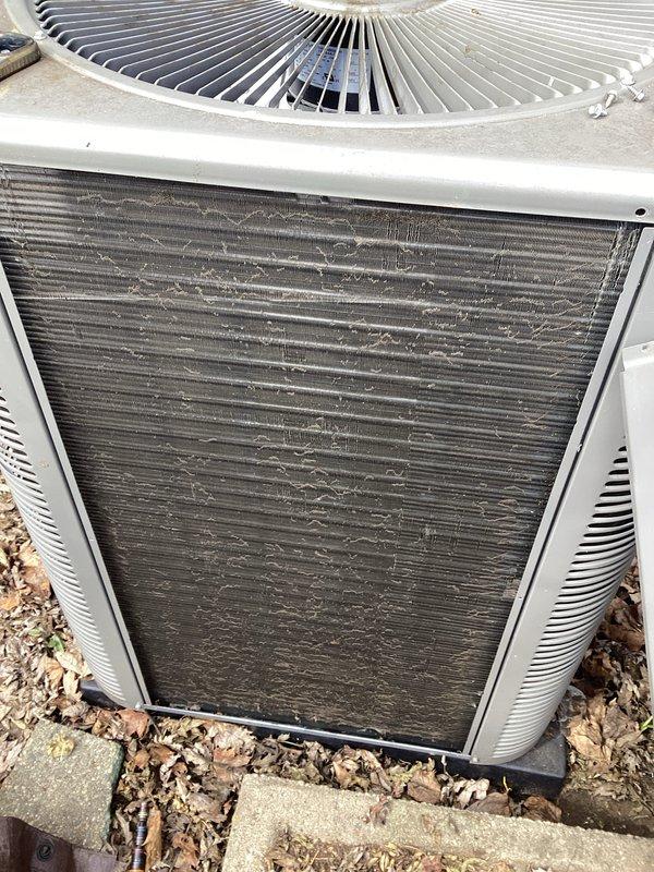 Performed scheduled air conditioner maintenance and found condenser coils severely clogged with debris, significantly reducing system efficiency. Thoroughly cleaned condenser coils to restore proper airflow and heat exchange capability. Noted customer's request for line set foam insulation for future service.