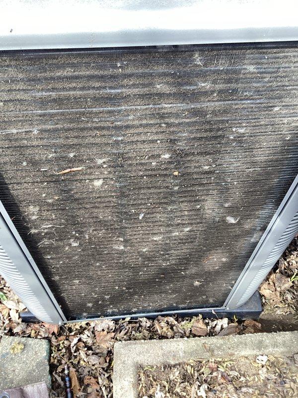 Performed scheduled air conditioner maintenance and found condenser coils severely clogged with debris, significantly reducing system efficiency. Thoroughly cleaned condenser coils to restore proper airflow and heat exchange capability. Noted customer's request for line set foam insulation for future service.