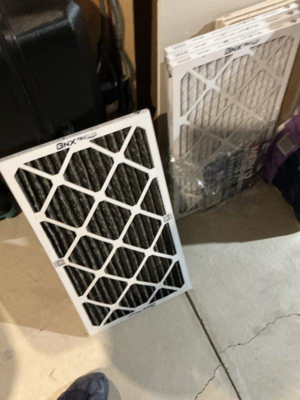 Responded to service call for a 15-year-old forced air furnace not adequately distributing warm air despite system being operational. Performed diagnostic testing using Klein Tools digital temperature meter at floor registers to verify airflow issues. Installed new BNX carbon air filters to replace existing filters, resolving restricted airflow problem and restoring proper heat distribution throughout the home.