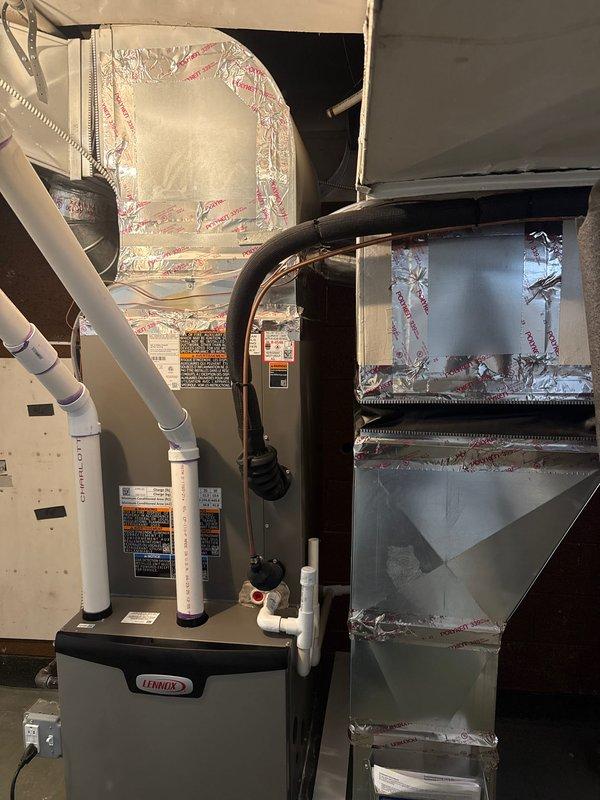Completed warranty repair on Lennox furnace system to address code violations. Properly secured all ductwork with three screws at equal spacing and sealed all unauthorized openings in the duct system. Verified complete system operation with proper ventilation and condensate drainage functionality.