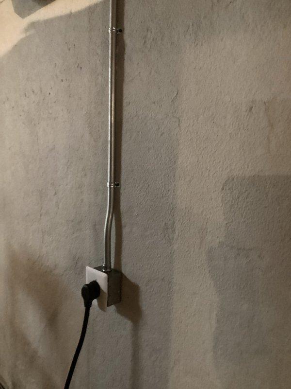 Installed a dedicated 30 amp 120 volt circuit from main panel to basement for sauna installation. Ran metal conduit along wall with proper securing clamps and terminated at a junction box. Verified proper connections, circuit protection, and tested functionality before completion.